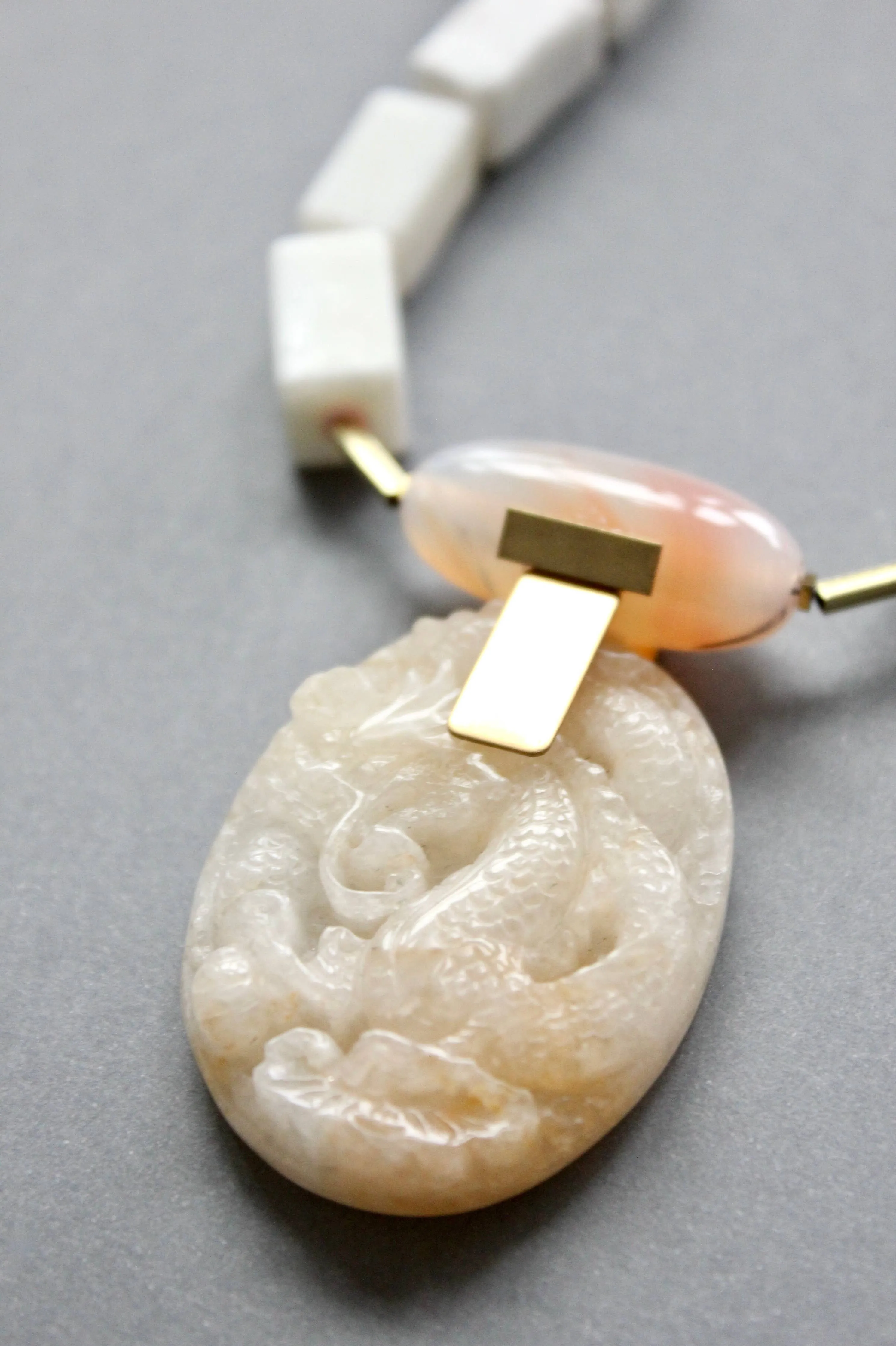 Carved jade and agate pendant necklace